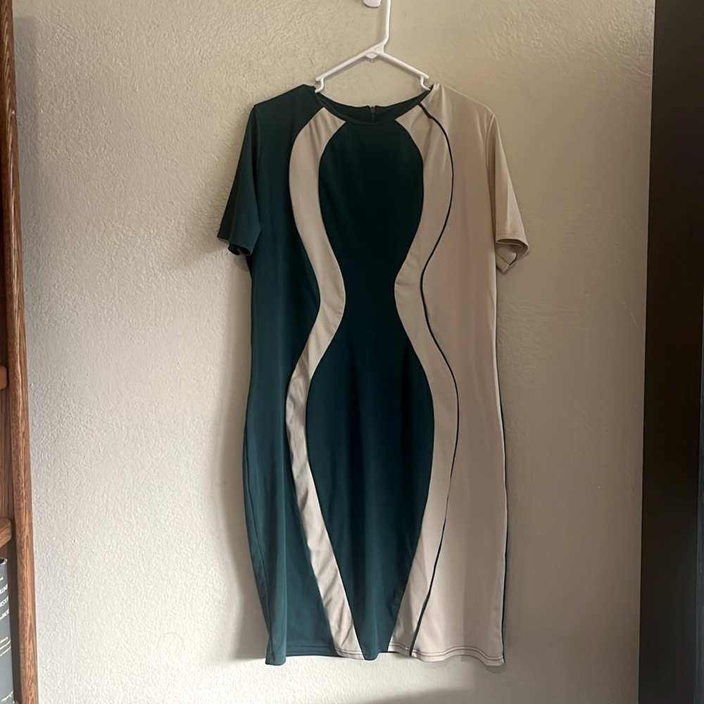 Green and cream / tan dress with an asymmetrical hourglass pattern
